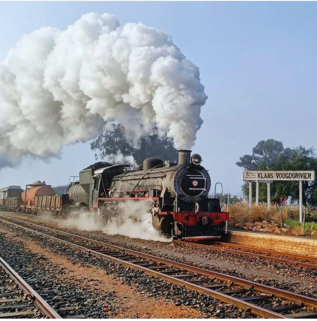 Heritage steam train passing Klaas Voogdsriver station